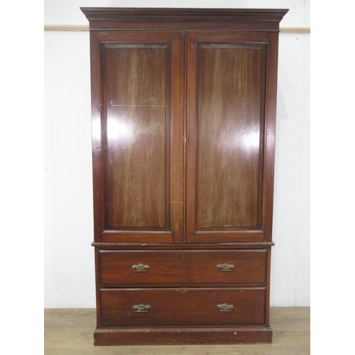 556 - A 19th Century mahogany Linen Press the base fitted two short and one long drawer 7ft H x 4ft 1in W