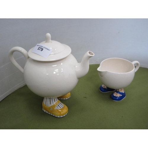 579 - A novelty Lustre Carlton, walking Ware Teapot and milk Jug