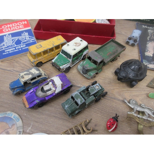 613 - A box of diecast Models, Badges and Commemorative Coins