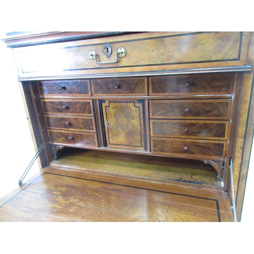 623 - A Continental 19th Century walnut Escritoire fitted fall front with fitted interior and four drawers... 