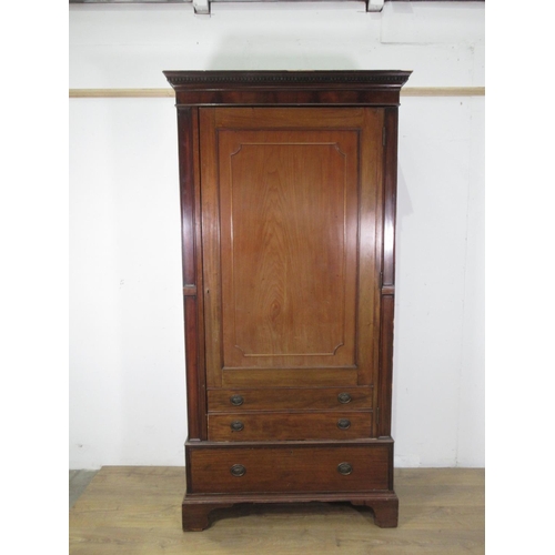 627 - A 19th Century mahogany Cupboard fitted single drawer with two dummy drawers above single drawer to ... 