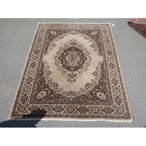 660 - A Kasham Rug on beige ground with multi borders and floral motif 7ft 11in L x 5ft 6in W