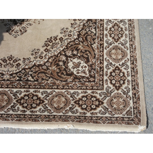 660 - A Kasham Rug on beige ground with multi borders and floral motif 7ft 11in L x 5ft 6in W