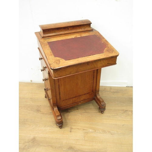 94 - A Victorian walnut veneered and inlaid Davenport fitted a bank of four drawers and four dummy drawer... 