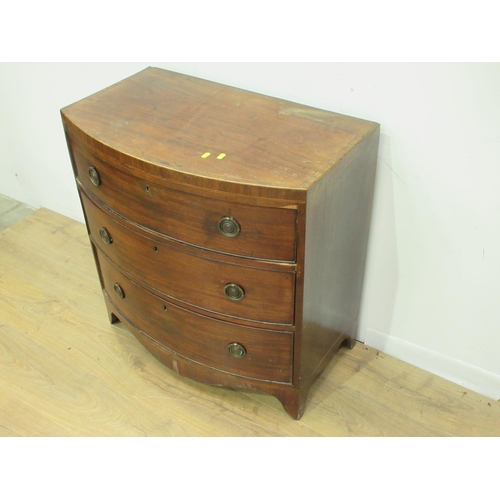 98 - A 19th Century mahogany bow fronted Chest of three long drawers on splayed feet 2ft 7in H x 2ft 6in ... 