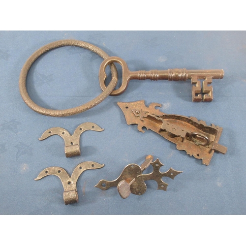 583 - A large antique church door Key on ring, three Corkscrews, a Bottle Opener, an early iron Lock and t... 