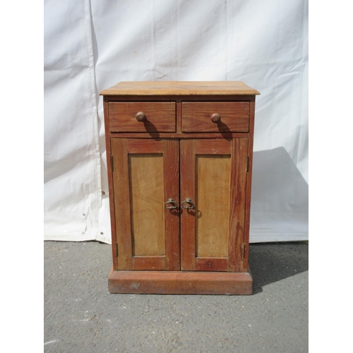 635 - A pitch pine Cupboard fitted two drawers above two doors 3ft H x 2ft 1in W