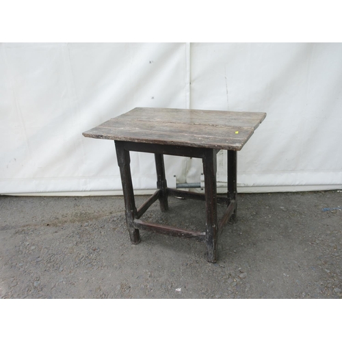 644 - A 17th or early 18th Century oak Side Table with two plank top on chamfered supports 2ft 7in W x 2ft... 