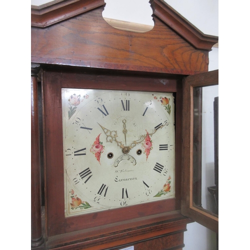 553 - A 19th Century oak and mahogany crossbanded Longcase Clock with painted dial by H. Toleman, Carnarvo... 