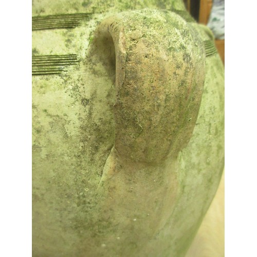 86 - A terracotta Urn with four handles 2ft 6in H