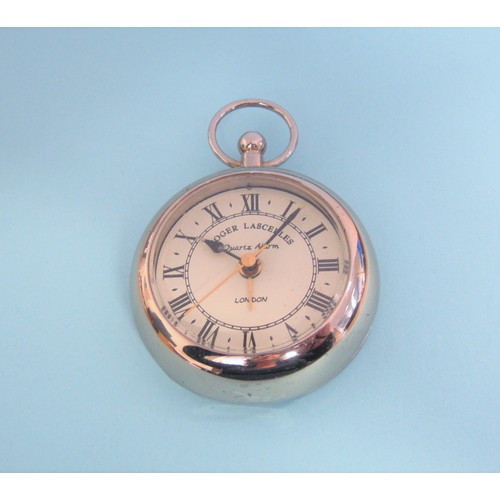 221 - A Roger Lascelles quartz Travel Alarm Clock in the form of a pocket watch in silver plated case