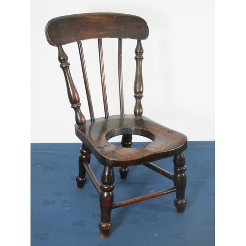 406 - A child's ash and elm commode Chair with bar back and turned supports and stretchers, 1ft 11in H