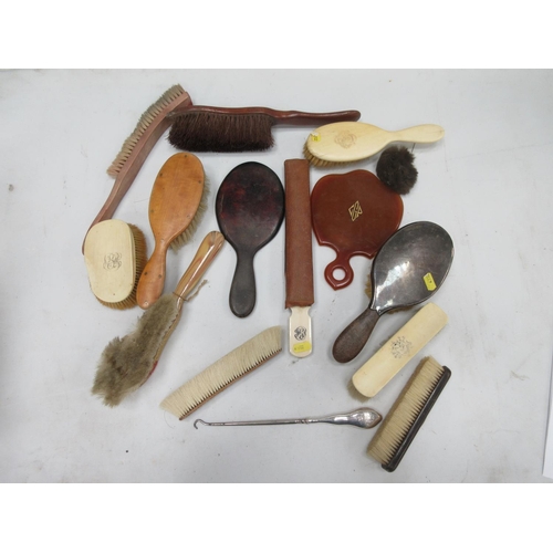 197a - A silver handled Button Hook and a collection of Hair Brushes, Clothes Brushes etc