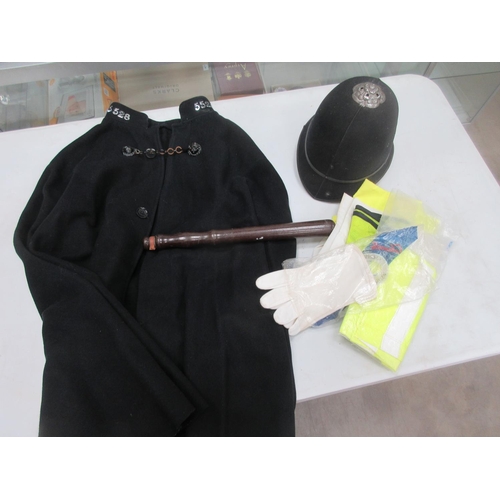 217 - 1950's Police Helmet, Cloak/Cape with lion head clasp, Truncheon etc