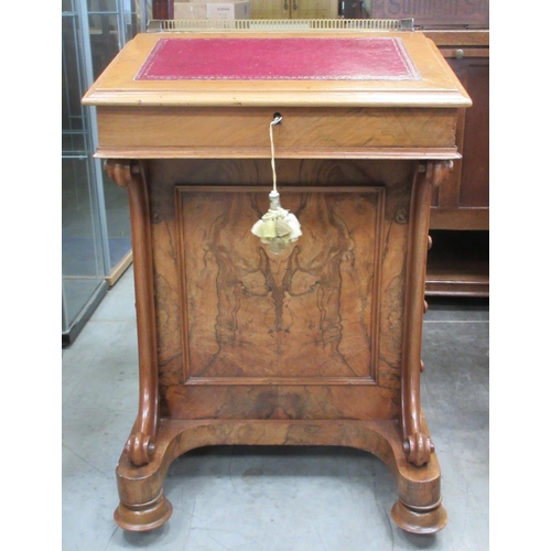 367 - A Victorian walnut Davenport with leather inset writing surface fitted small drawer above four drawe... 