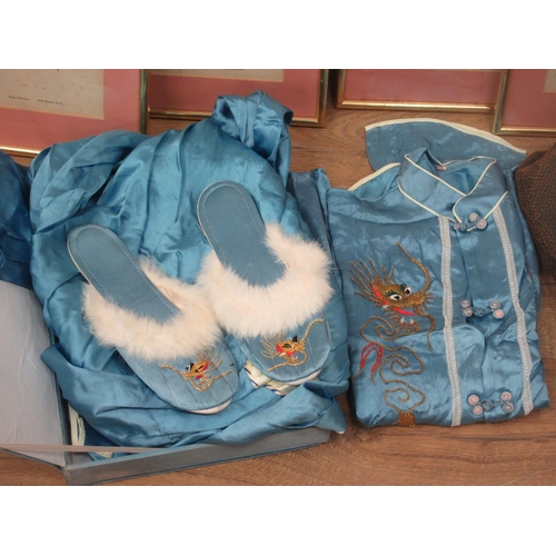 524A - A Chinese blue silk Tunic, Robe and Slippers, a Doctor's Bag and four framed Prints