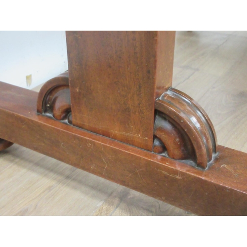 525A - A Victorian mahogany Centre Table on squared end supports and bun feet 3ft 11in W x 2ft 5in H