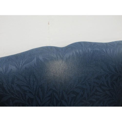 532 - An Edwardian blue upholstered Wingback Armchair 3ft 2in H and another on square cut tapering support... 