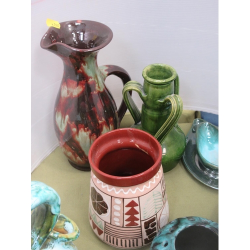 561 - A collection of green glazed stoneware items and Studio Pottery