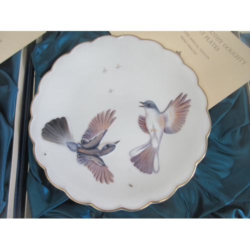 605 - Ten boxed Royal Worcester Birds of Dorothy Doughty Dessert Plates