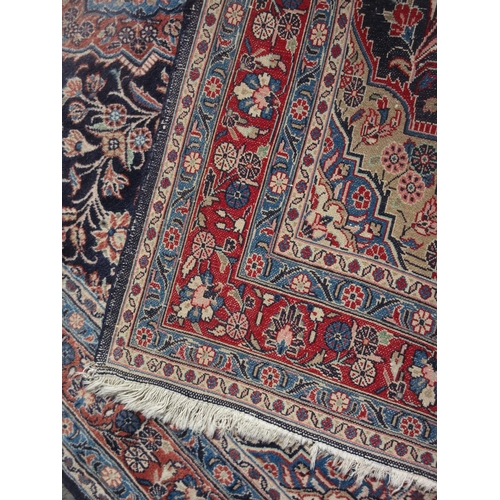 655 - A blue ground Rug with central lozenge within multiple borders 7ft x 4ft 5in