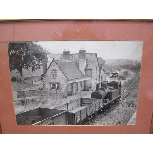 664 - PETRIE. A framed photo (reprint) depicting trains at Bromsgrove Railway Station; a framed photo (rep... 