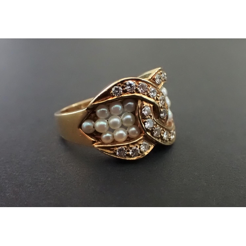 123 - A Diamond and Cultured Pearl Ring formed as interlocking C's pavé-set brilliant-cut diamonds with gr... 