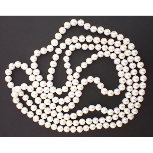 135 - An opera length string of Cultured Pearls