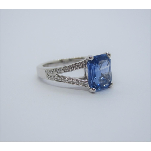 138 - A Ceylon Sapphire and Diamond Ring corner claw-set unheated mixed-cut rectangular sapphire, 1.89cts,... 