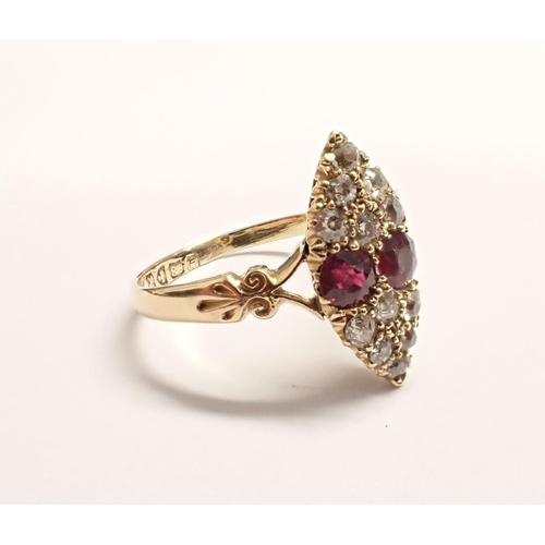 151 - An Edwardian Ruby and Diamond Ring, the marquise shaped plaque pavé-set two round rubies between twe... 