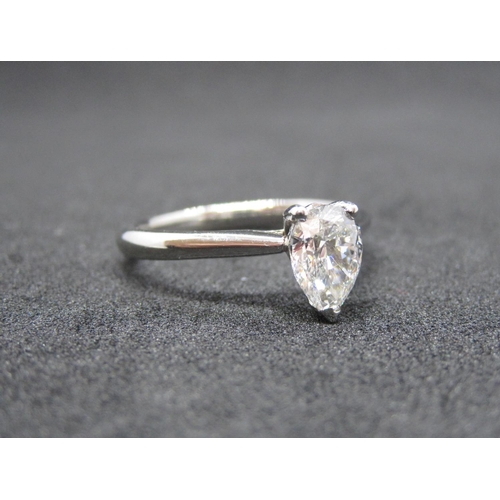 160 - A Diamond single stone Ring claw-set pear-cut stone, 0.90cts, in platinum, ring size P