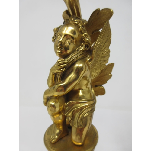 208 - A pair of ormolu Candlestick with figural columns of boy and girl winged cherubs on dolphin supports... 