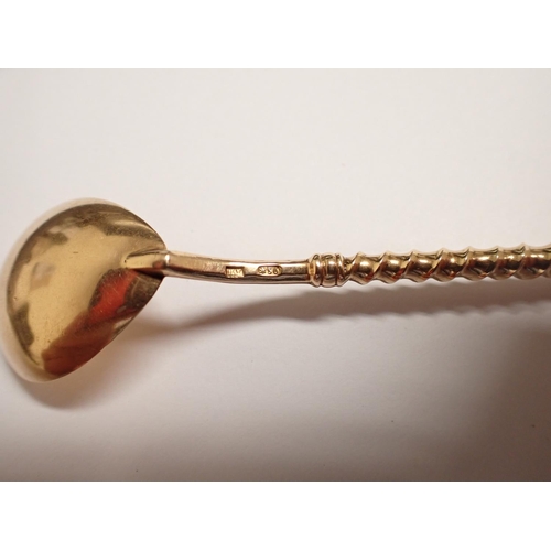 211 - A gold Spoon with pear shape bowl, spiral stem with knop finial set turquoise, ruby and emerald type... 