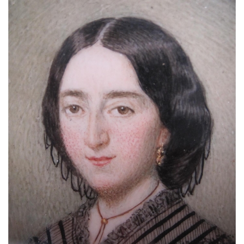 222 - CONTINENTAL SCHOOL, c.1830. Portrait miniature of a Lady, quarter-length, wearing a black dress, ova... 