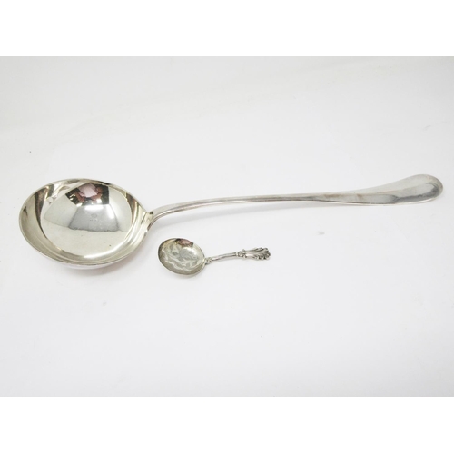 23 - A Victorian silver Caddy Spoon with leafage engraved circular bowl, Birmingham 1838, maker: G. Unite... 