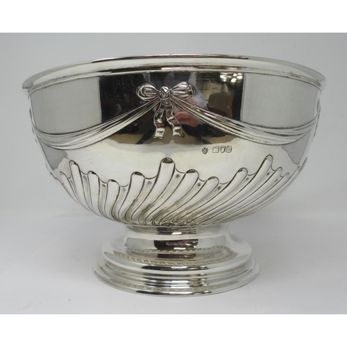 25 - A Victorian silver Rose Bowl with ribbons and swags above spiral fluting, London 1897, 10 3/4in diam... 