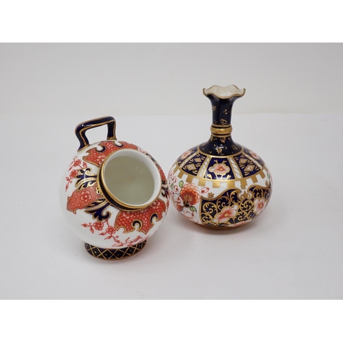 267 - A Crown Derby domed Match Striker with floral Imari coloured decoration, small chip to interior of l... 