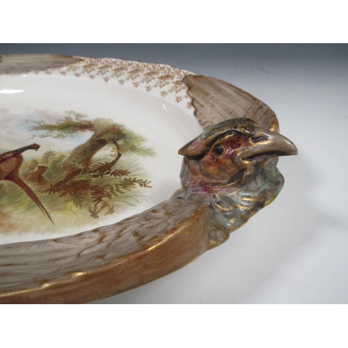 272A - A Royal Worcester service painted individual scenes with gamebirds, viz: Oval Platter with pheasant ... 