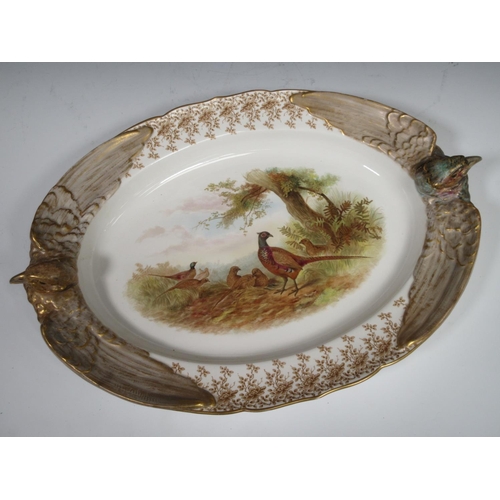 272A - A Royal Worcester service painted individual scenes with gamebirds, viz: Oval Platter with pheasant ... 