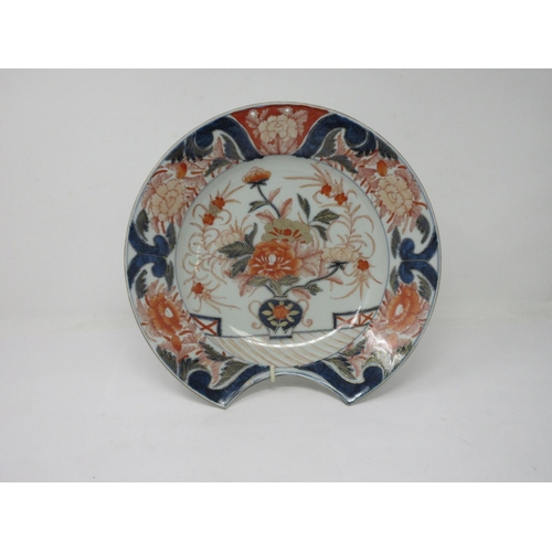 277 - An Imari Barber's or Bleeding Dish decorated vase of flowers and floral designs to the underside, 11... 