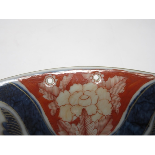 277 - An Imari Barber's or Bleeding Dish decorated vase of flowers and floral designs to the underside, 11... 