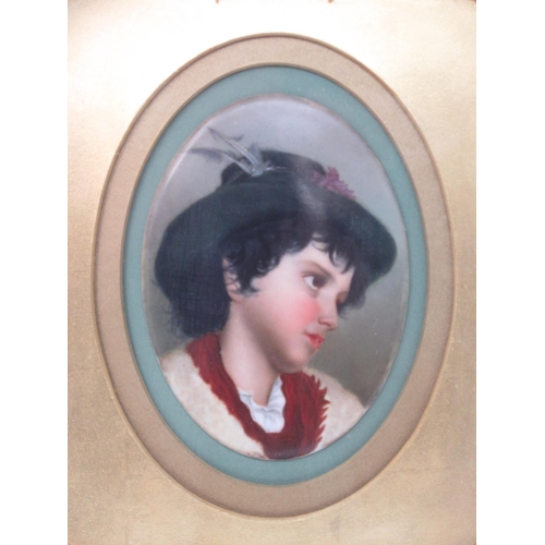 285 - A 19th Century Berlin style oval Portrait of a boy on porcelain panel within gilt frame and later gl... 