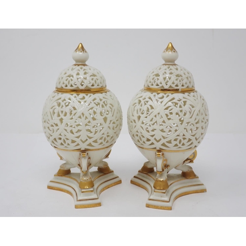 288 - A pair of Grainger & Co. Worcester reticulated Vases and Covers, C.1870's, the tapering bulbous bodi... 