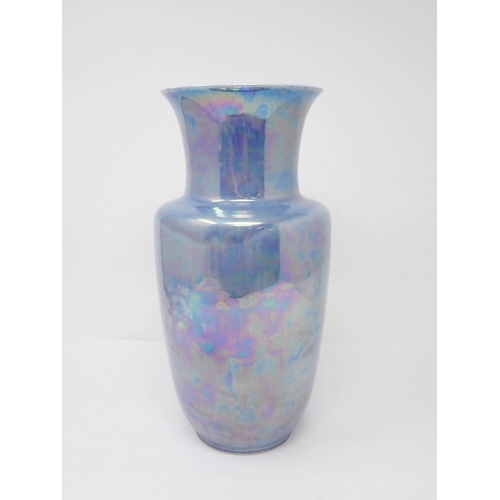 300 - A Ruskin high fired blue irridescent glaze impressed mark dated 1924, 12in H, and a similar glazed B... 