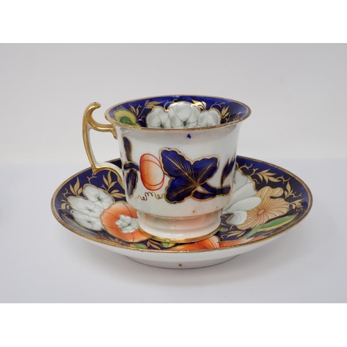 303 - A First Period Worcester Cup, Coffee Cup and Saucer, floral painted decoration, blue border with gil... 