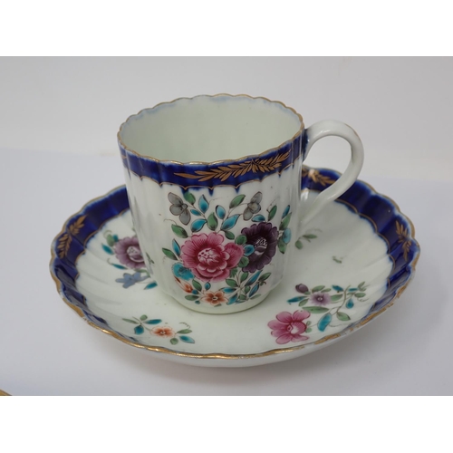 303 - A First Period Worcester Cup, Coffee Cup and Saucer, floral painted decoration, blue border with gil... 