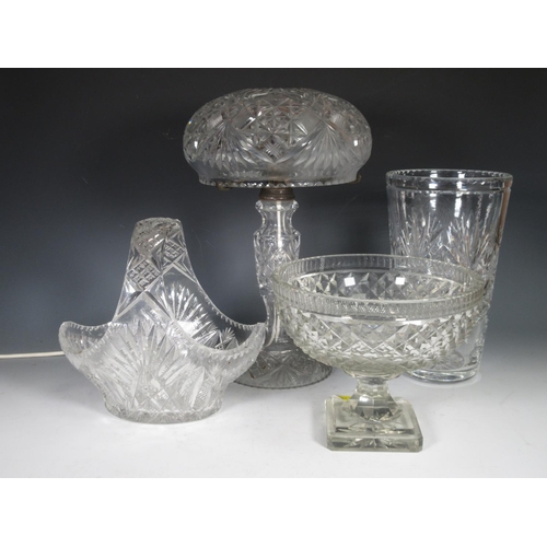 304 - A cut glass Table Lamp with domed shade, cut glass Basket Dish, tall tapering Vase, and a Pedestal B... 