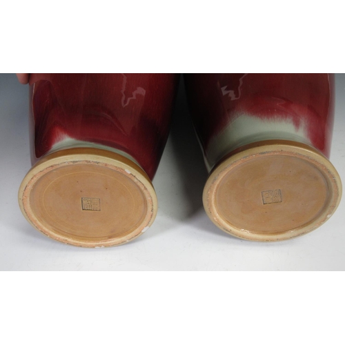 313 - A pair of Chinese song de boeuf Vases with flared rims, single square character mark, 21 in H