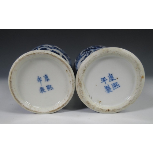 315 - A pair of 19th Century Chinese blue and white Vases of baluster form, decorated dragons and flowers,... 