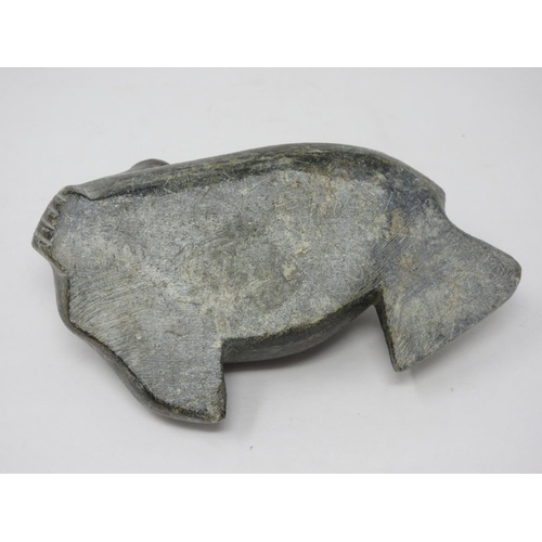 323 - An Inuit carved stone sculpture of a Walrus, scratch signed 'Jimmy' to underside 6 1/2in L